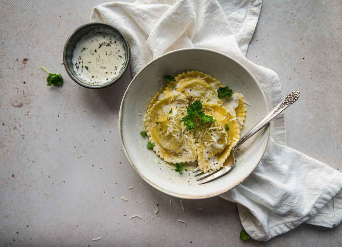 Mezzeluna pasta with asparagus